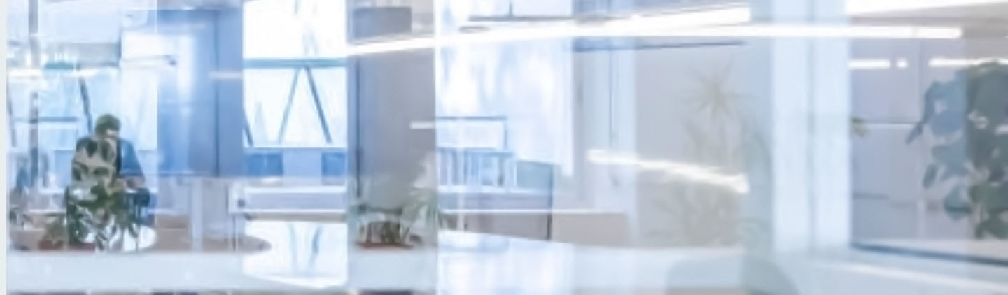 Blurred banner image of a corporate office
